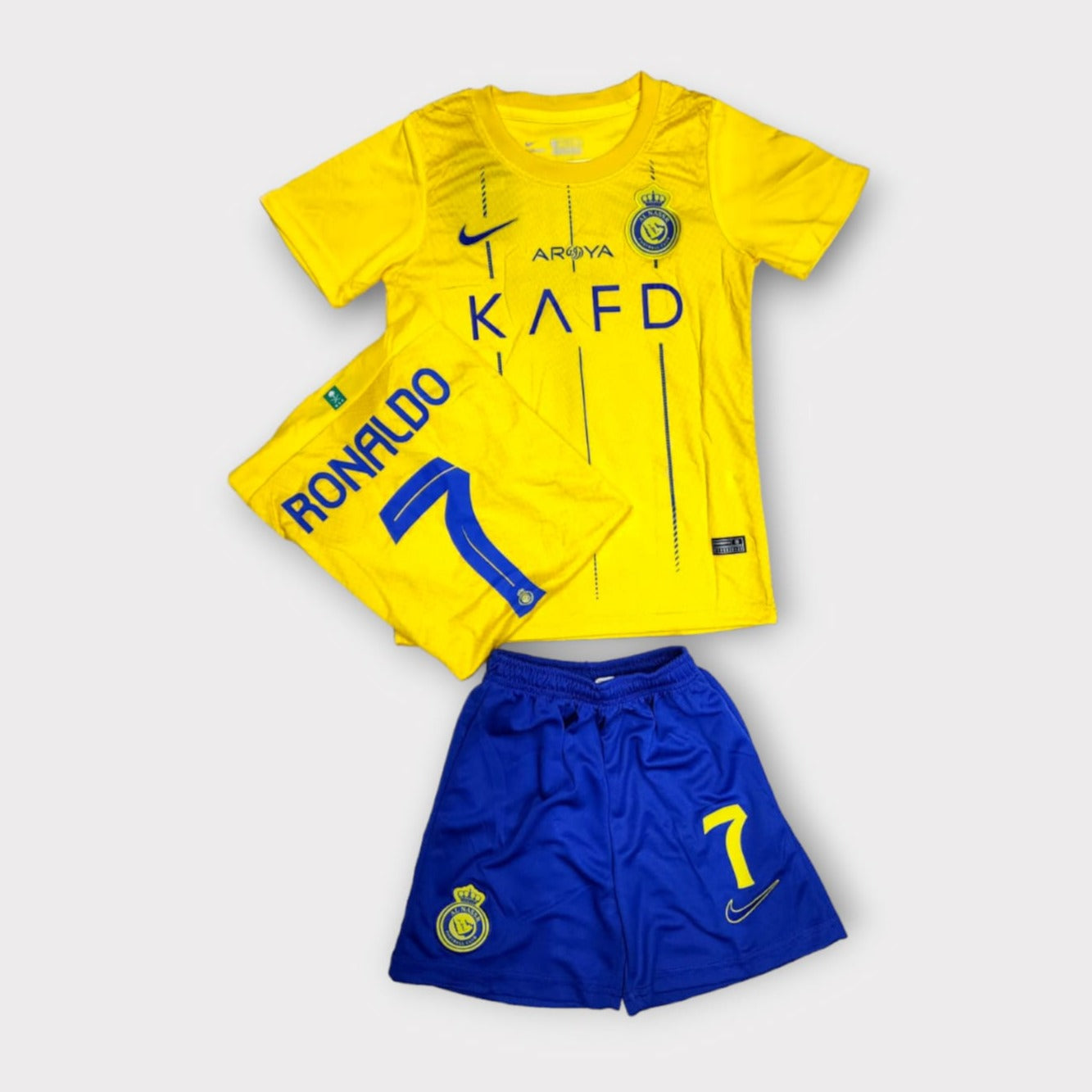 Cristiano Ronaldo #7 NASSR Riyadh Al Home 2024/2025 Kids Soccer Jersey/Shorts Gift Set for Fans Youth Sizes